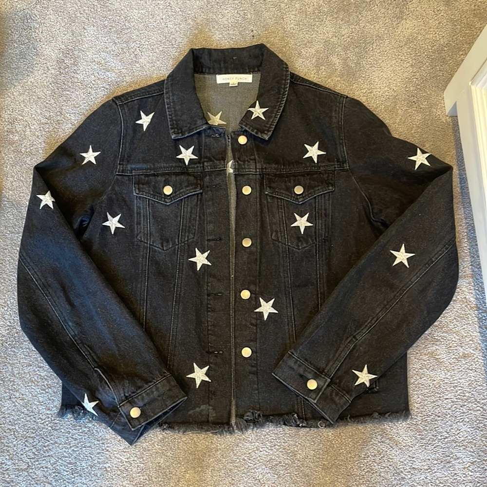 Black denim jacket with stars
